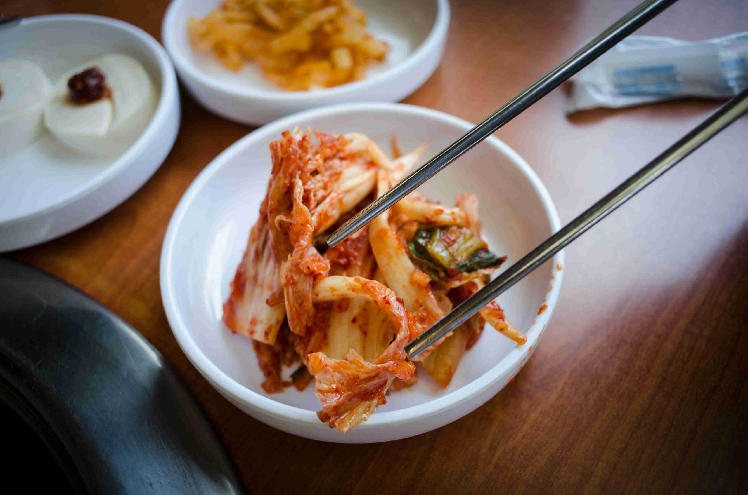 Kimchi in white ceramic bowl