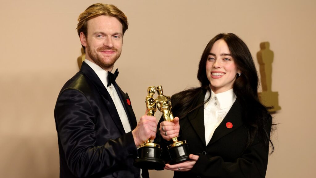 Billie Eilish and FINNEAS after winning an Oscar