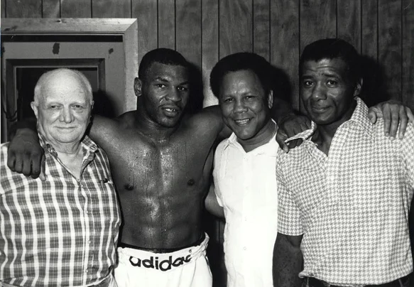 Cus D'Amato with Mike Tyson, Jose Torres and Floyd Patterson.